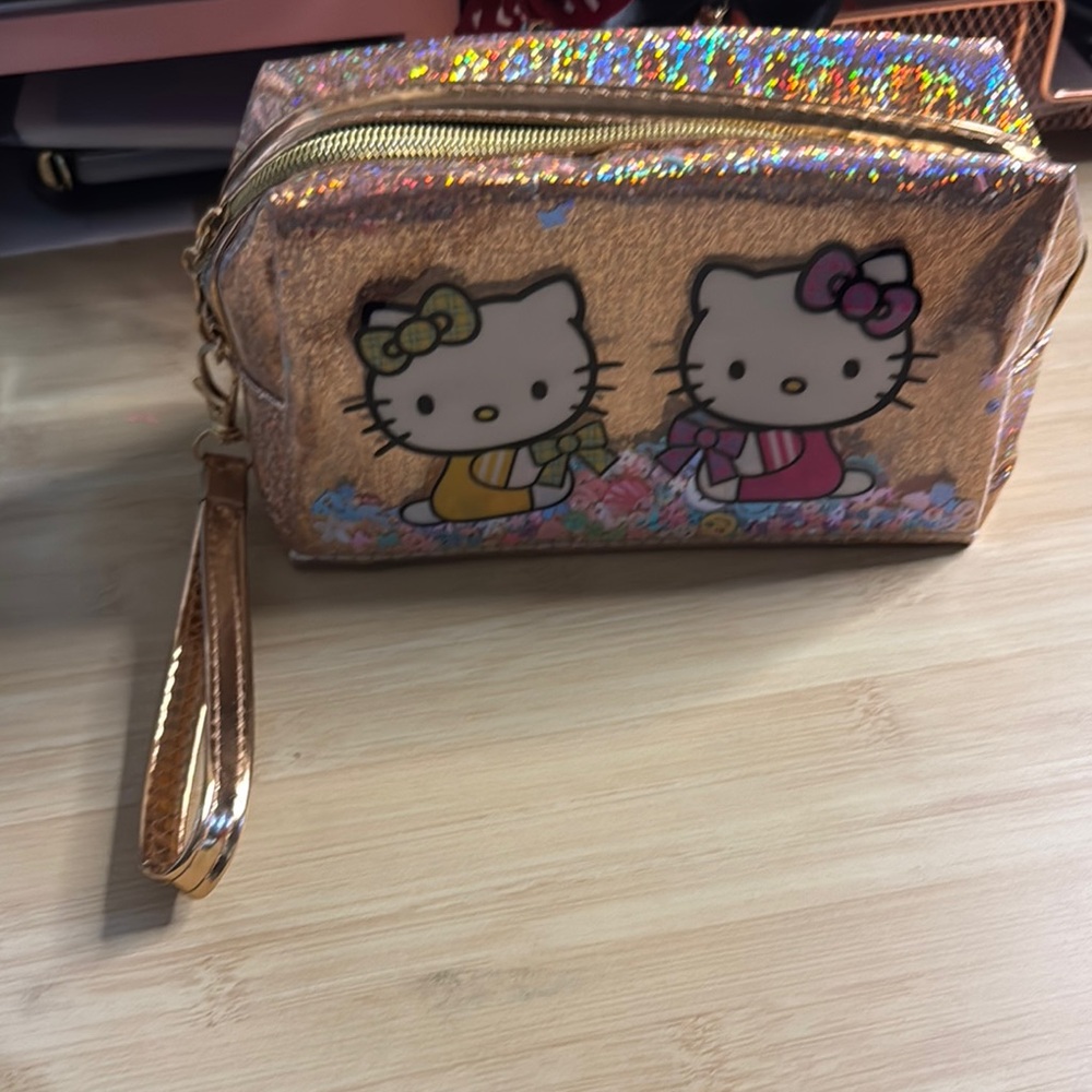 Hello Kitty Gold Wristlet Bag